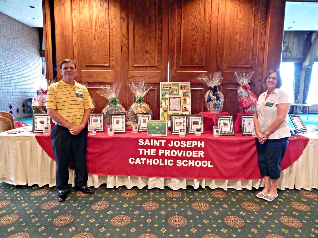 Saint Joseph the Provider Catholic School basket raffle table at fundraiser