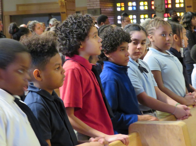 Catholic school students in mass
